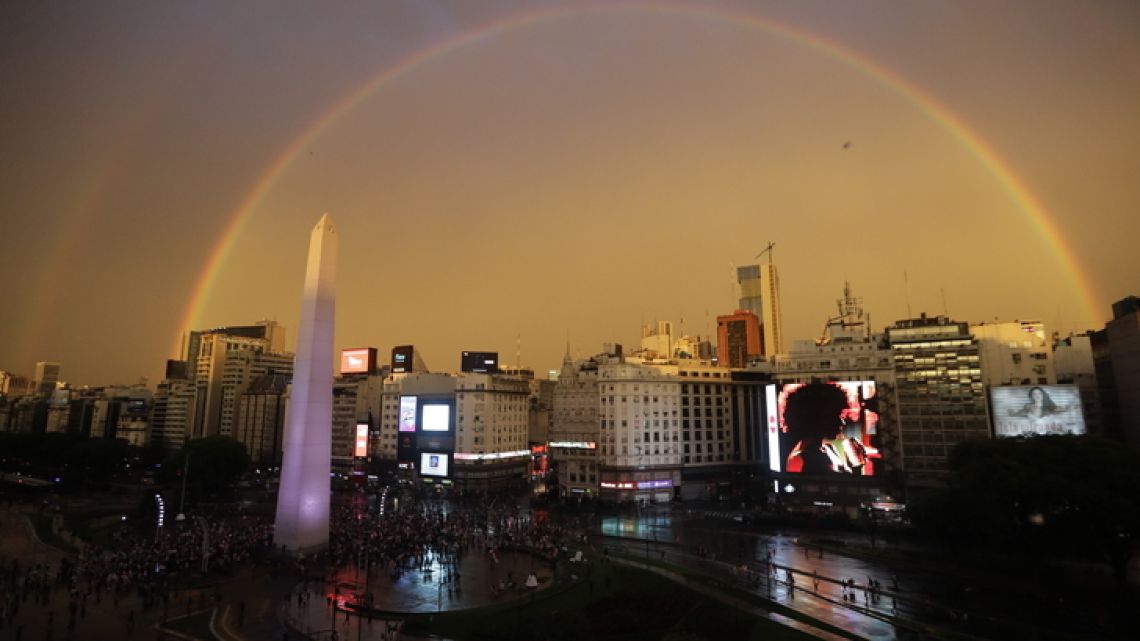 Buenos Aires and its double rainbow in the sky.