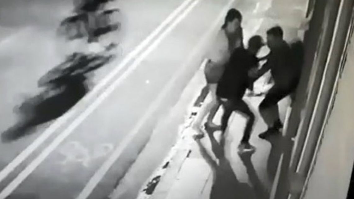 A screenshot of video footage caputring the attack.