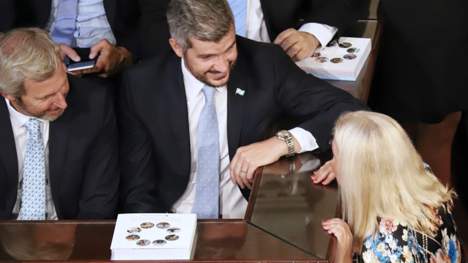 Peña y Carrió en una foto en el Congreso en 2018, con Frigerio de testigo.