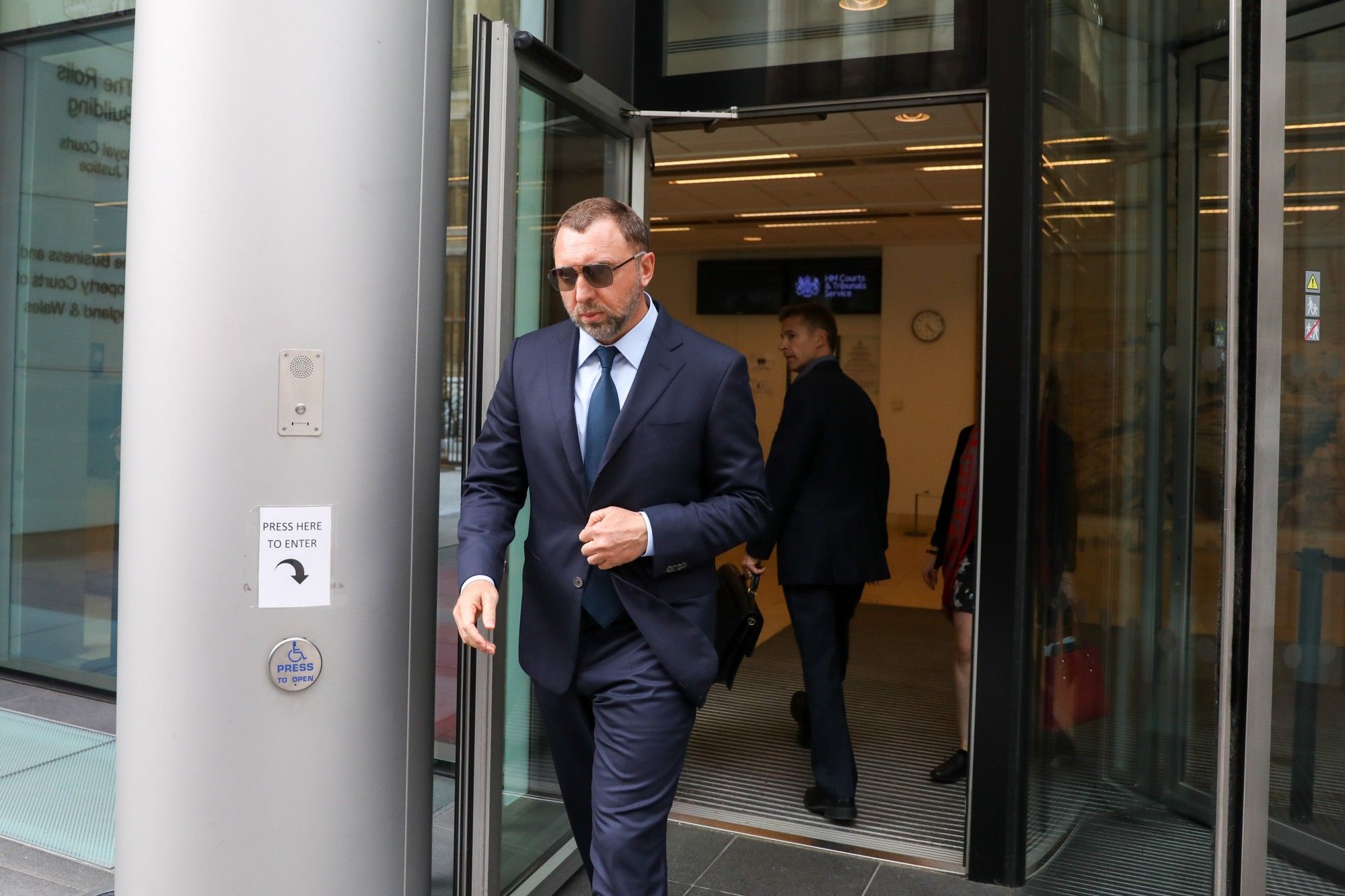 Billionaire Oleg Deripaska Attends Court Hearing Over Control Of Nornickel 