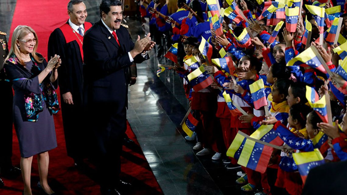 Nicolás Maduro greets supporters after having been sworn into office for a new term.