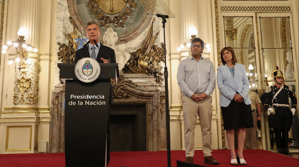Mauricio Macri junto a los ministros de Justicia, Germán Garavano, y de Seguridad, Patricia Bullrich.