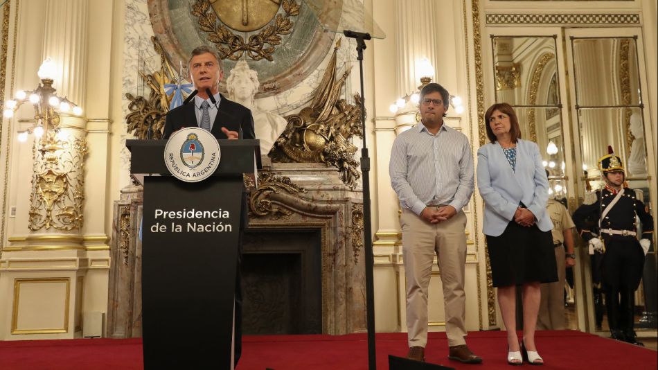 El presidente Mauricio Macri junto a los ministros Patricia Bullrich (Seguridad) y Germán Garavano (Justicia).