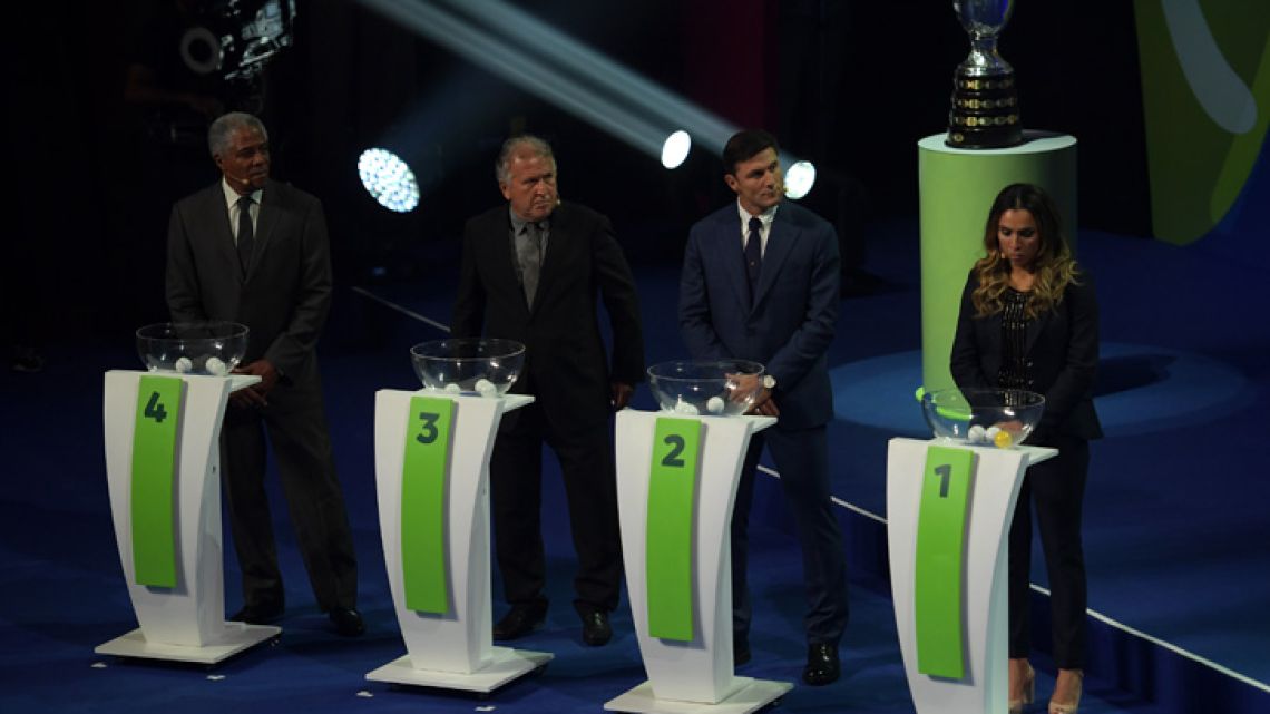 Former footballers Francisco Maturana of Colombia, Zico of Brazil and Javier Zanetti of Argentina and Brazilian footballer Marta take part in the draw of the 2019 Copa America football tournament in Rio de Janeiro, Brazil, on January 24, 2019. The 2019 Copa América will be held in Brazil between June 14 and July 7.