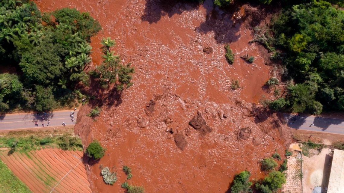 An aerial view shows flooding triggered by a collapsed dam near Brumadinho, Brazil, Friday, Jan. 25, 2019. 