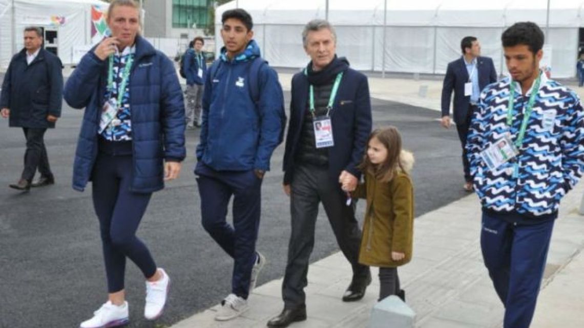 President Mauricio Macri and his daughter Antonia visit the Youth Olympic Village during the 2018 Games in Buenos Aires.