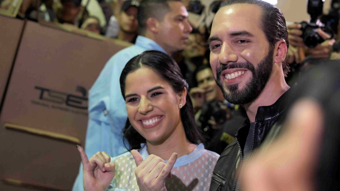 Salvadoran President Nayib Bukele and his wife Gabriela Rodriguez pose after voting during the Salvadoran presidential election in February.