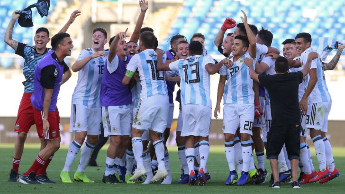 Argentina celebrate after defeating Uruguay 2-1 on Thursday.