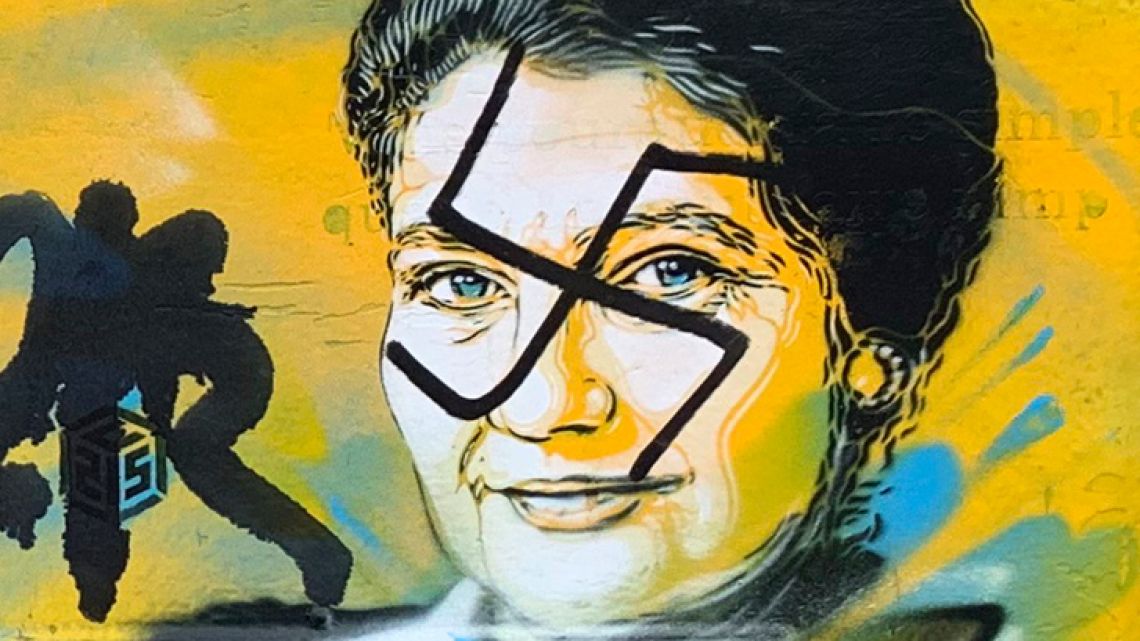 This photo taken on Monday, February 11, 2019 and provided by the Paris city hall of the XIIIth district shows a mailbox with swastikas covering the face of the late Holocaust survivor and renowned French politician, Simone Veil, in Paris, France. According to French authorities, the total of registered anti-Semitic acts rose to 541 in 2018 from 311 in 2017, a rise of 74 percent. 