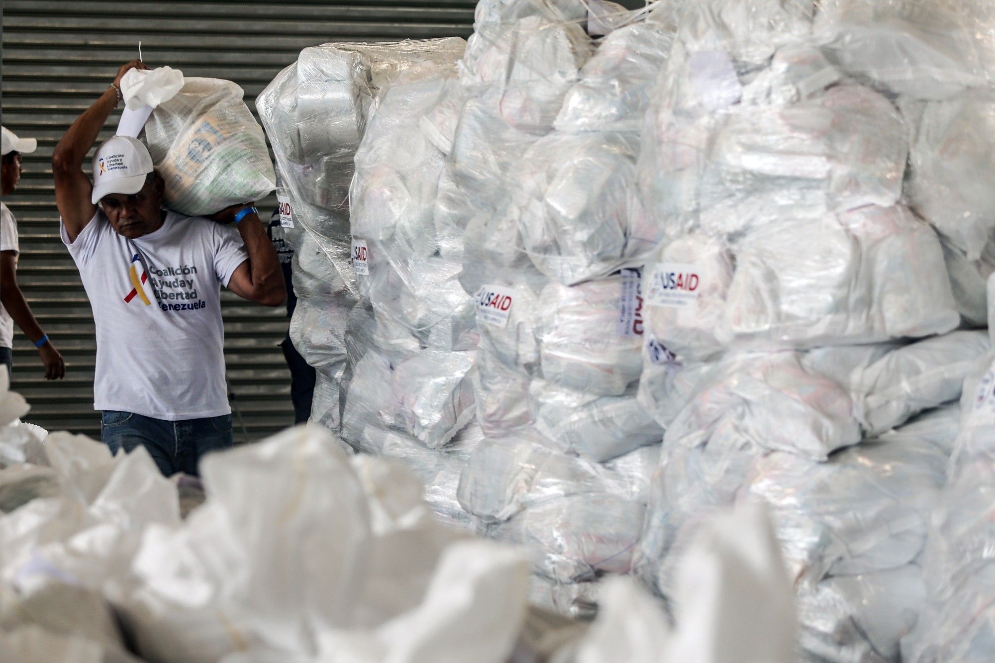 Humanitarian Aid Arrives At Border As Maduro Pledges To Block Supplies 