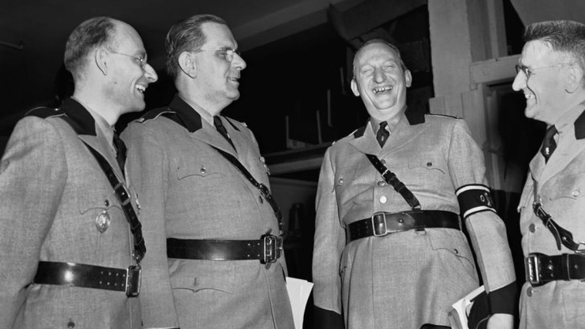 National leader of the German-American Bund, Fritz Kuhn (second from the left), stands with the national director of the Organisation for the Bund, Gustave Elmer (third from the left), and two other uniformed Bundsmen just prior to the Bund rally held on February 20, 1939 at New York’s Madison Square Garden. 