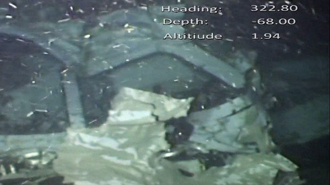 A handout video footage still image released by the UK Air Accidents Investigation Branch (AAIB) on February 25, 2019 and created on February 3, 2019 shows the cabin and break in fuselage from the wreckage of the Piper Malibu aircraft, N264DB, that crashed carrying footballer Emiliano Sala and pilot David Ibbotson.