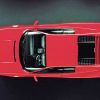 La Testarossa impuso varios elementos al line-up de Ferrari en los años 90:  las entradas de aire tipo branquias en los laterales, y la rejilla posterior  ocultando los faros.