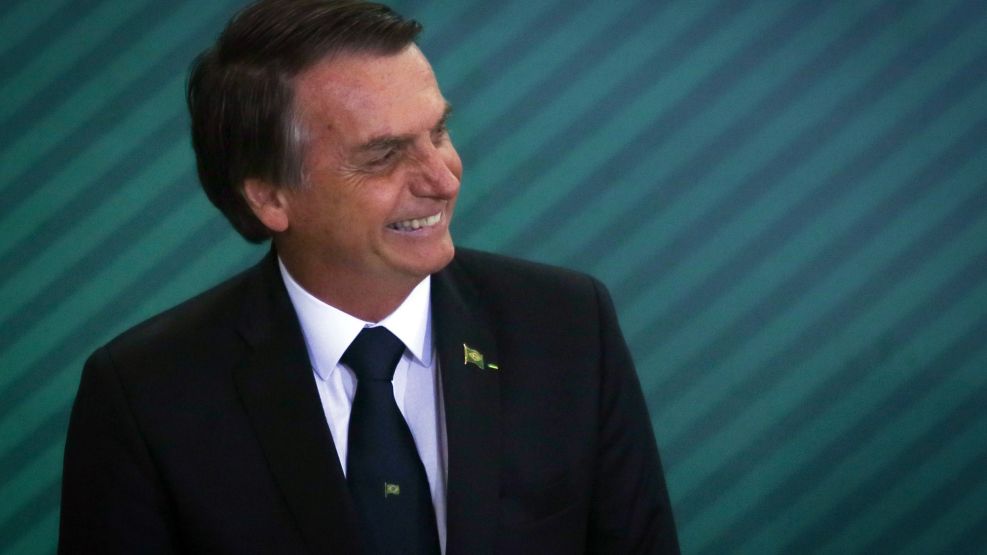 Brazil's Bolsonaro Eases Gun Laws and Woos Weapon Makers