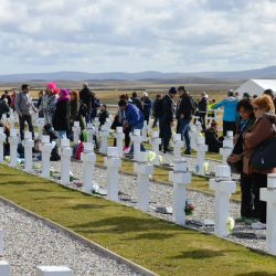 The Malvinas winds eased and the sun came out as family members mourned.