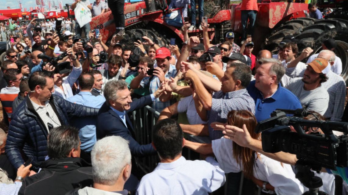 President Mauricio Macri is welcomed by attendees at ExpoAgro 2019.
