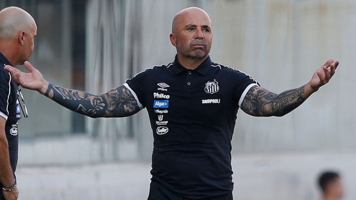 Jorge Sampaoli, coach of Brazil's Santos, yells instructions to his players during a Copa Sudamericana soccer match against Uruguay's River Plate in São Paulo, Brazil, Tuesday, Feb. 26, 2019. 