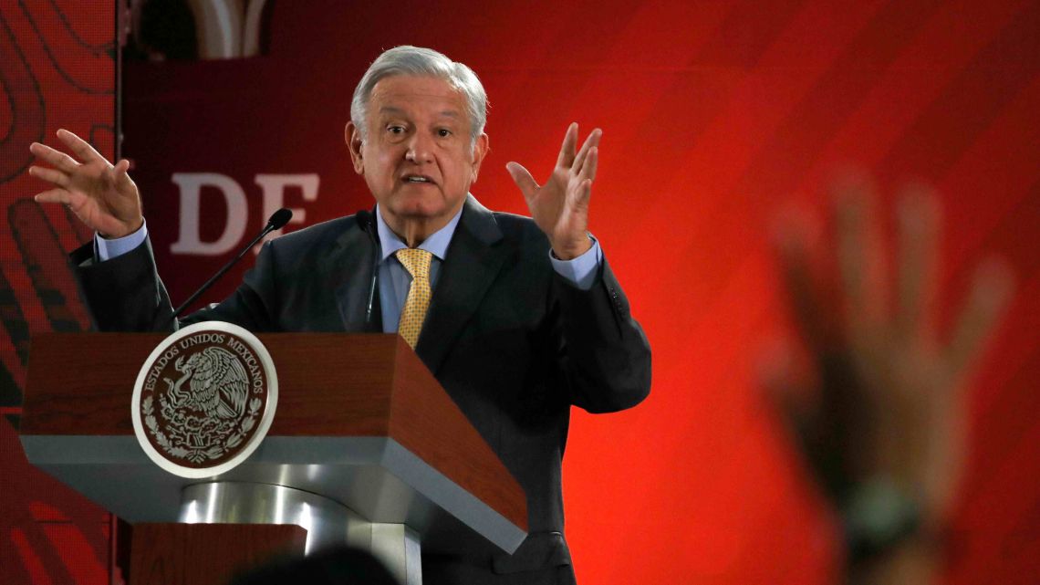 Mexican President Andres Manuel Lopez Obrador answers questions from journalists at his daily 7 a.m. press conference at the National Palace in Mexico City.