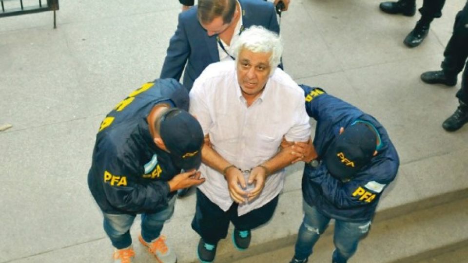 Archivo. Luego de la fuga en Belice, Alberto Samid llega esposado a Comodoro Py.