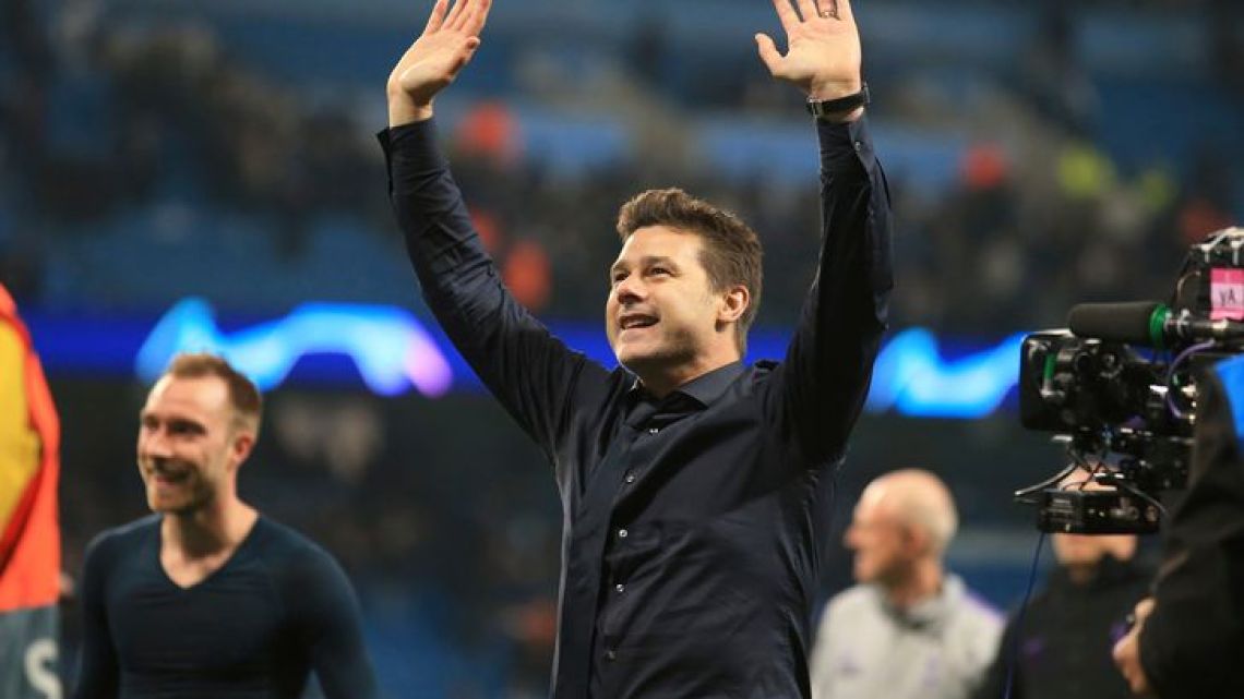   Tottenham coach Mauricio Pochettino waves to fans during the Champions League quarterfinal, second leg, football match between Manchester City and Tottenham Hotspur at the Etihad Stadium in Manchester, England, Wednesday, April 17, 2019. 