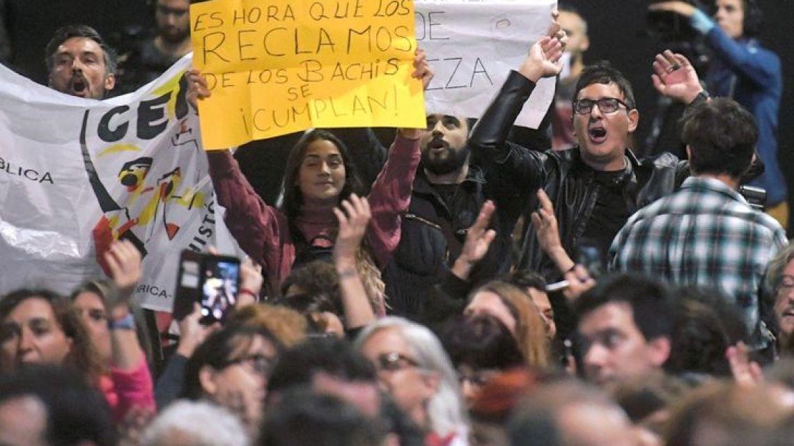 A group of protestors interrupted the speech of Pablo Avelluto, the culture minister, during the inauguration of the 45th International Book Fair in Buenos Aires, Argentina, on Thursday April 25, 2019.  
