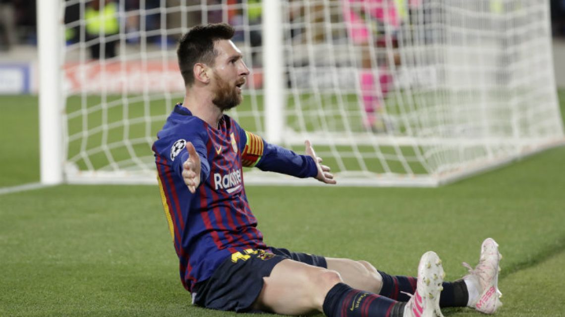 Barcelona’s Lionel Messi celebrates after scoring his side’s third goal during the Champions League semi-final, first leg match between FC Barcelona and Liverpool at the Camp Nou.