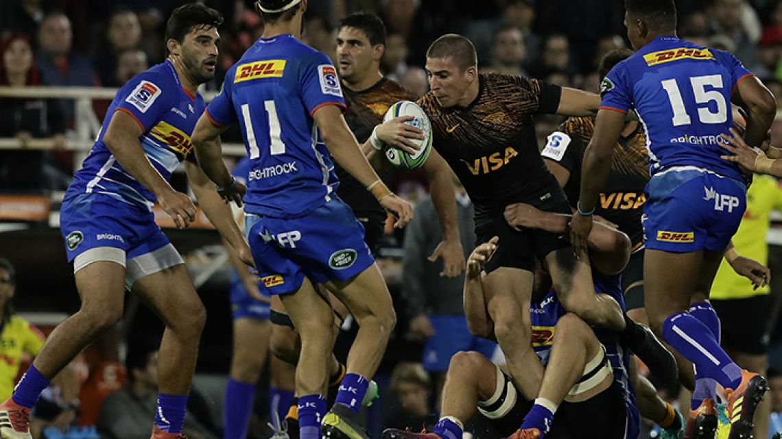 Jaguares wing Sebastián Cancelliere vies for the ball with South Africa's Stormers players during their Super Rugby match at José Amalfitani stadium in Buenos Aires, on May 4, 2019.  