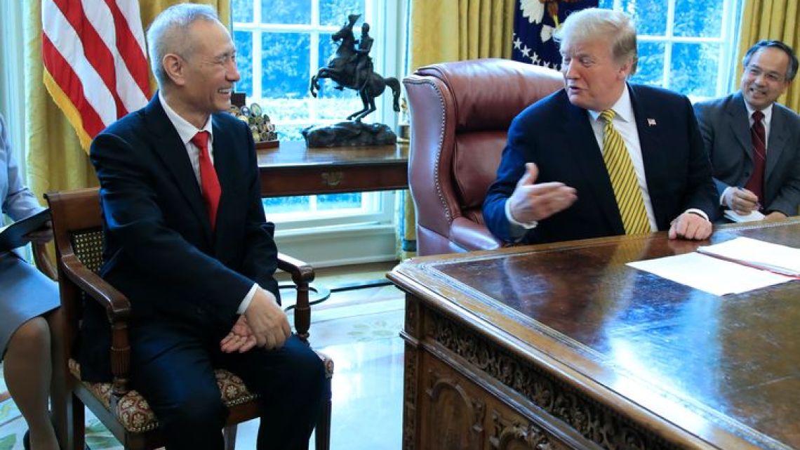 United States President Donald Trump meets with China’s Vice Premier Liu He in the Oval Office of the White House in Washington DC on April 4, 2019. 