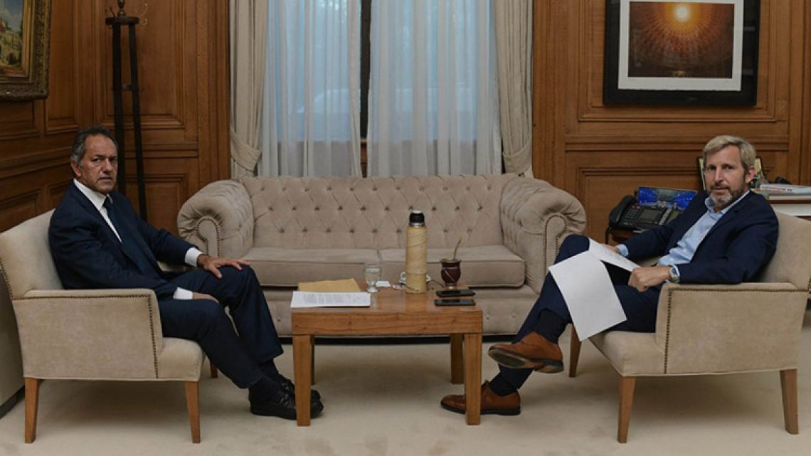 Former Buenos Aires governor Daniel Scioli with Interior Minister Rogelio Frigerio.