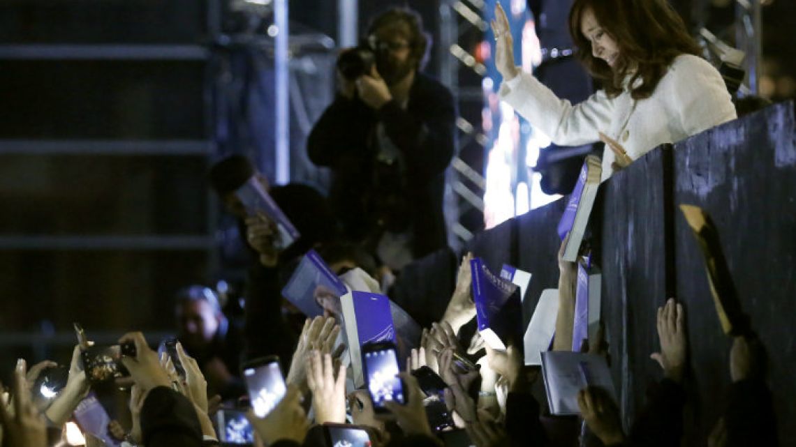 Cristina Fernández de Kirchner greets her supporters after presenting her book at the Buenos Aires International Book Fair on Thursday.