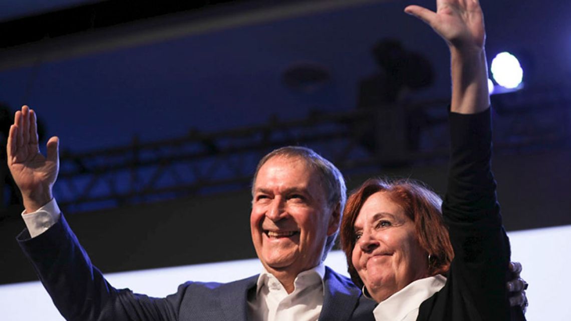 Peronist governor Juan Schiaretti celebrates on Sunday night, after winning the election in Córdoba.