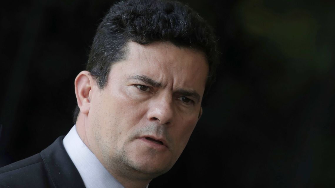Justice Minister Sérgio Moro, who was appointed by President-elect Jair Bolsonaro, speaks to the press as he arrives to Bolsonaro's team transition office in Brasilia, Brazil in 2018. Bolsonaro said on Sunday, May 12, 2019 that he will nominate the anti-corruption crusader to the Supreme Court whenever there is an opening.