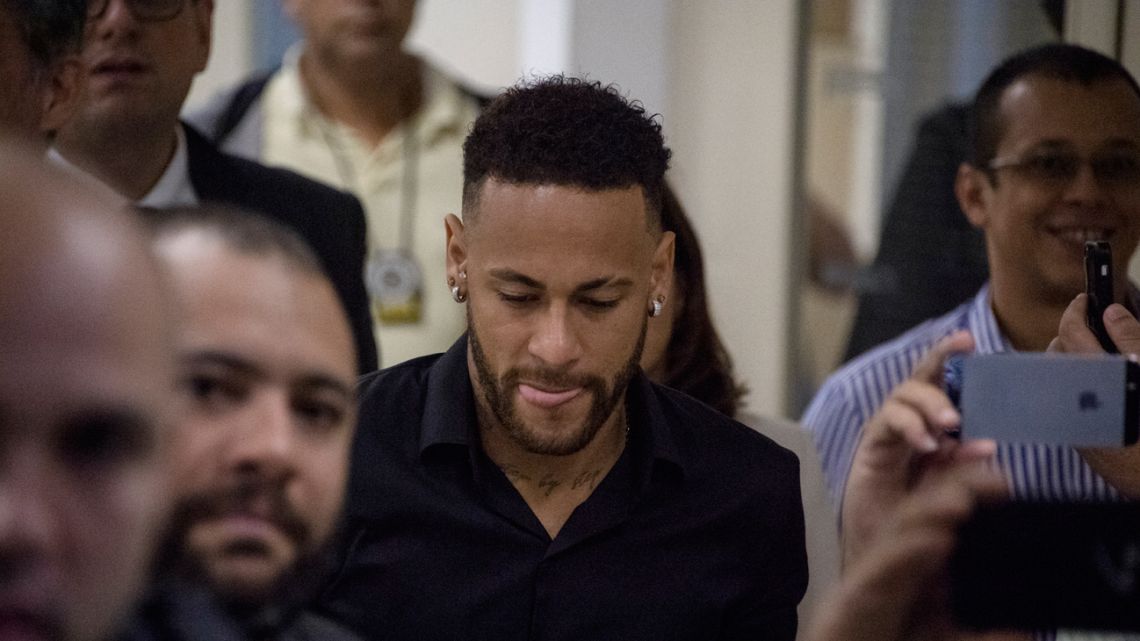Brazil's star striker Neymar leaves a police Station after giving a statement to police for posting intimate WhatsApp messages with Najila Trindade Mendes de Souza, who has accused of rape, on social media, at the Internet Crime Special Police Unit in Rio de Janeiro, Brazil on June 6, 2019.  
