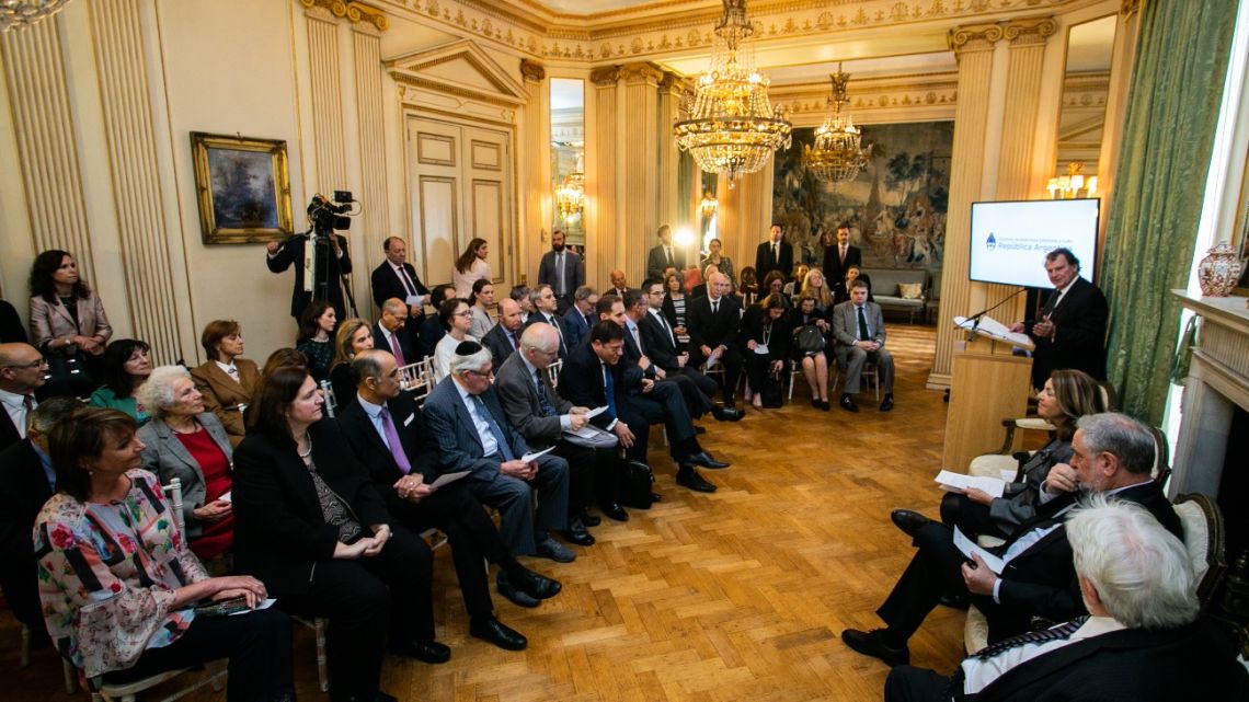 Argentine officials, leaders of the British community and other gather in London. 