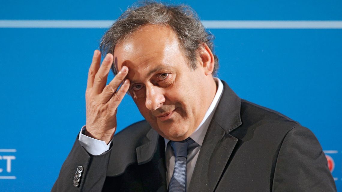 UEFA President Michel Platini arrives at a press conference, one day prior to the UEFA EURO 2016 qualifying draw.