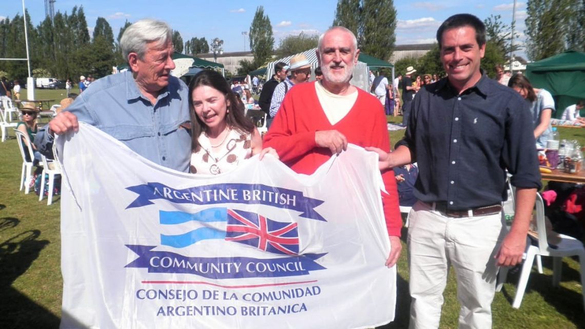 Andrew Graham-Yooll (second from right) and John Hunter (far right) at the Anglo-Argentine Society annual asado in London in 2015.