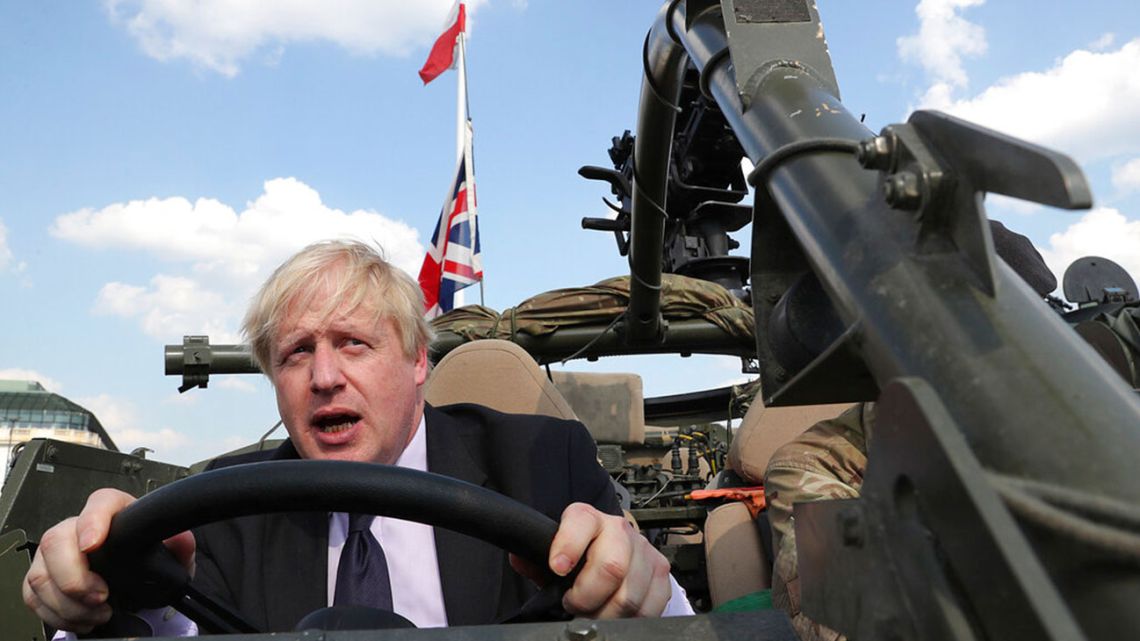 UK PM-to-be Boris Johnson drives military vehicle in Orzysz, Poland 