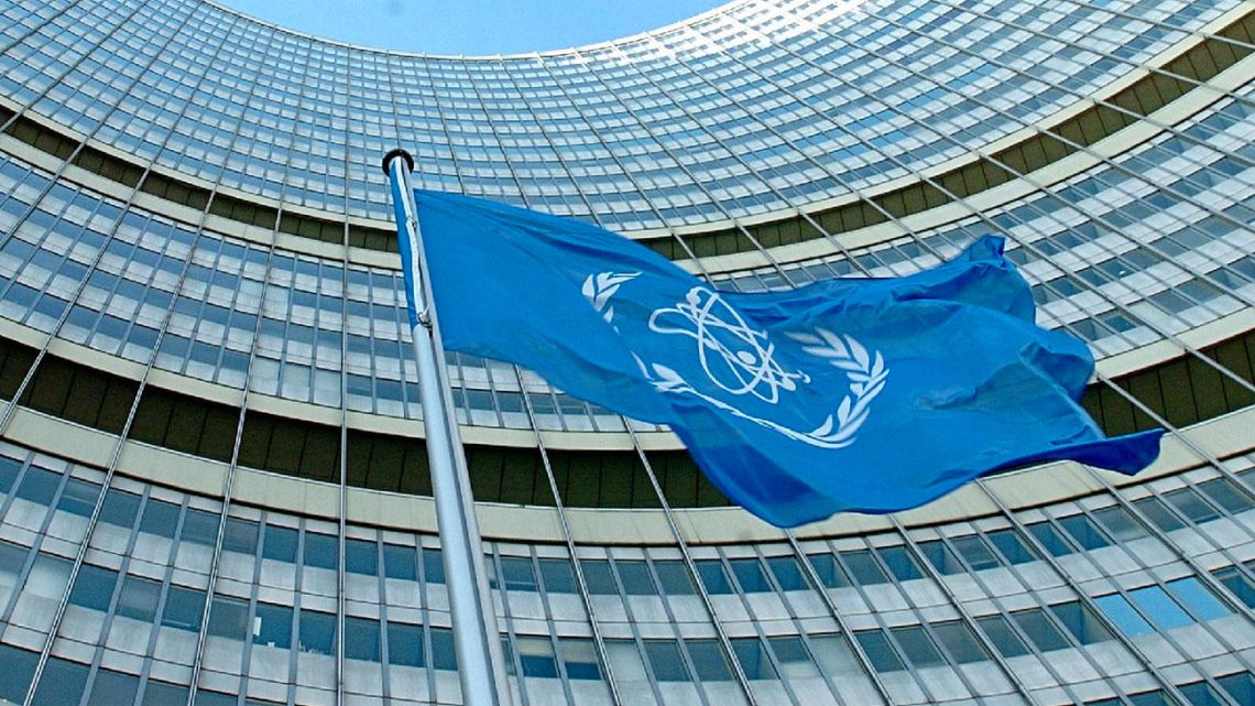 The flag of the International Atomic Energy Agency (IAEA), pictured outside its headquarters.