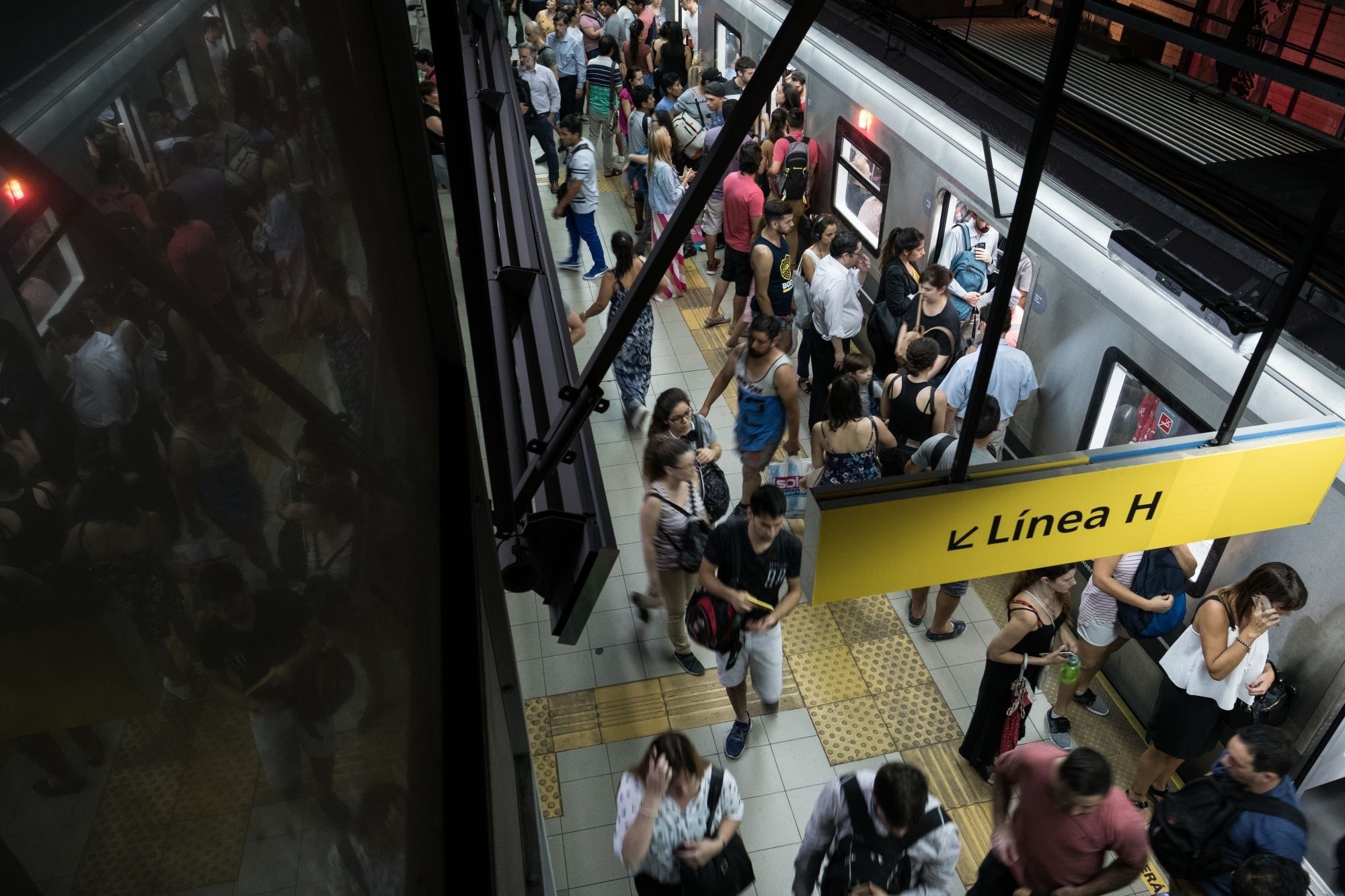 Argentina's Hot Summer Of Packed Subways, More Theft And Floods 