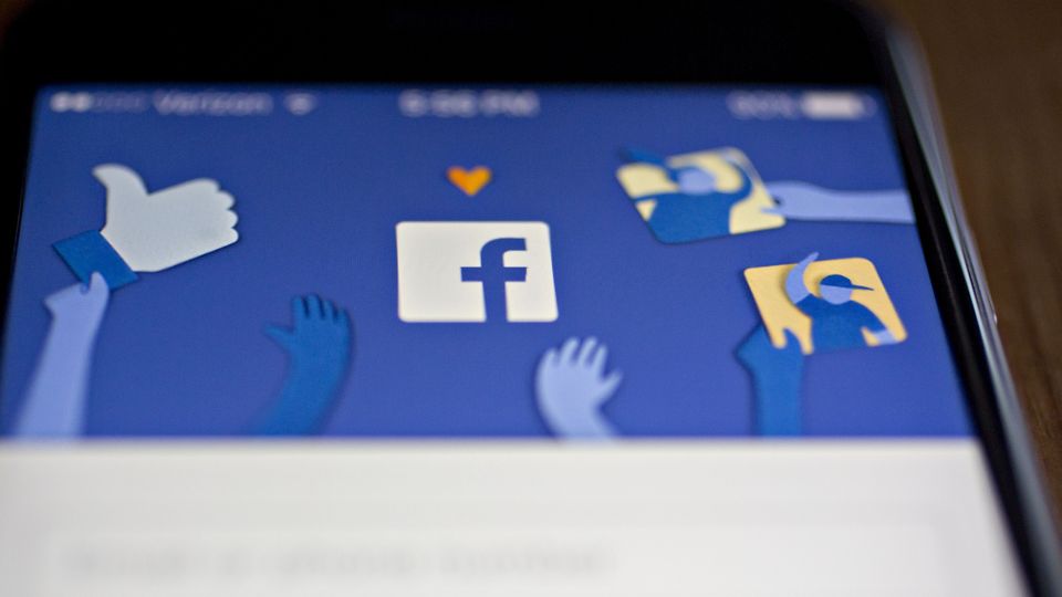 Facebook App And Logo As Crisis Reignites Washington Scrutiny Of Social Networks