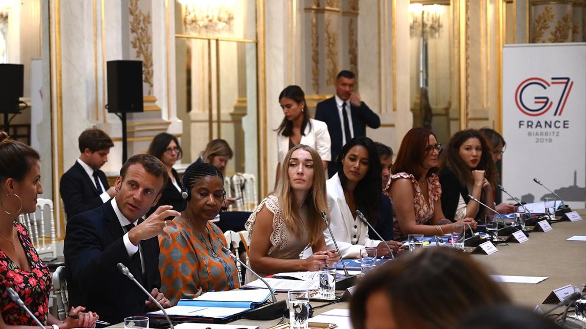 French President Emmanuel Macron (second from left) leads a meeting of the G7 Advisory Council for Equality between Women and Men as part of the 'Day of Dialogue at the Élysée presidential palace in Paris on August 23, 2019.  