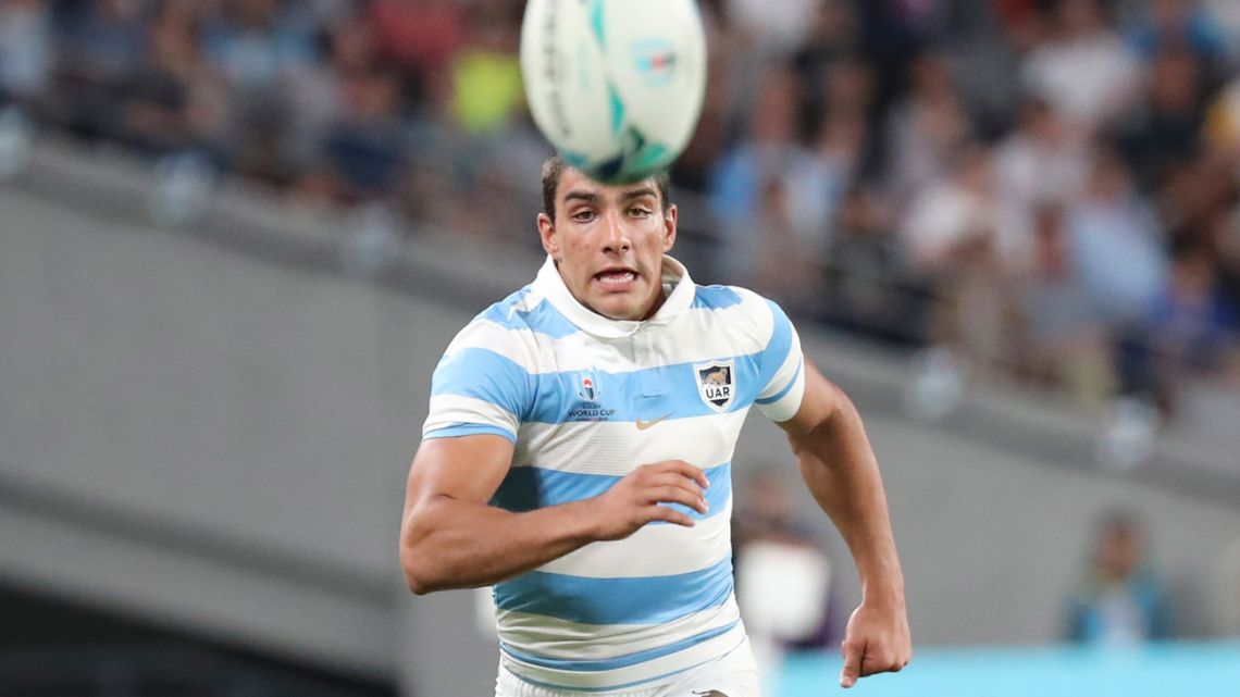 Argentina's Santiago Carreras chases a ball during the Rugby World Cup Pool C game at Tokyo Stadium between France and Argentina in Tokyo, Japan, Saturday, September 21, 2019.