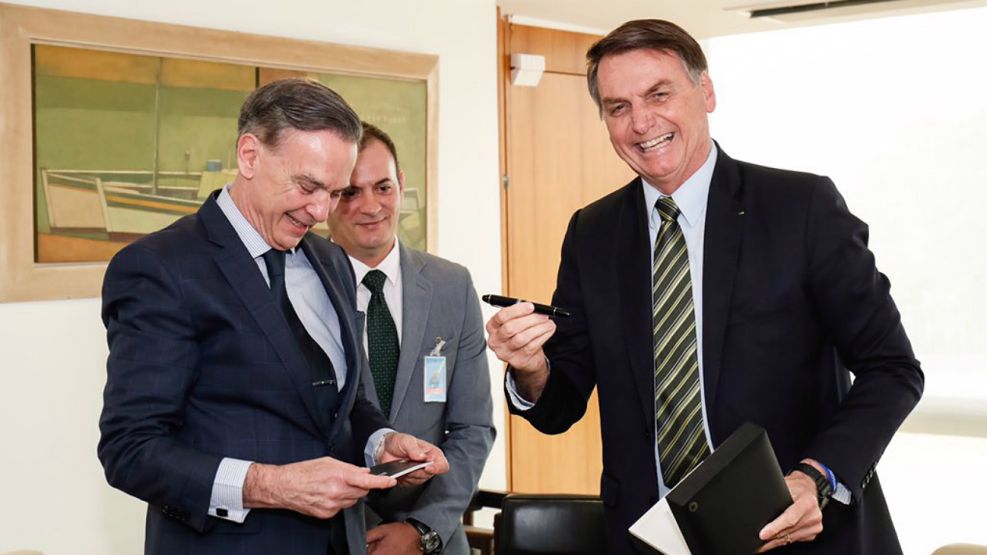 Miguel Ángel Pichetto en reunión junto a Jair Bolsonaro.