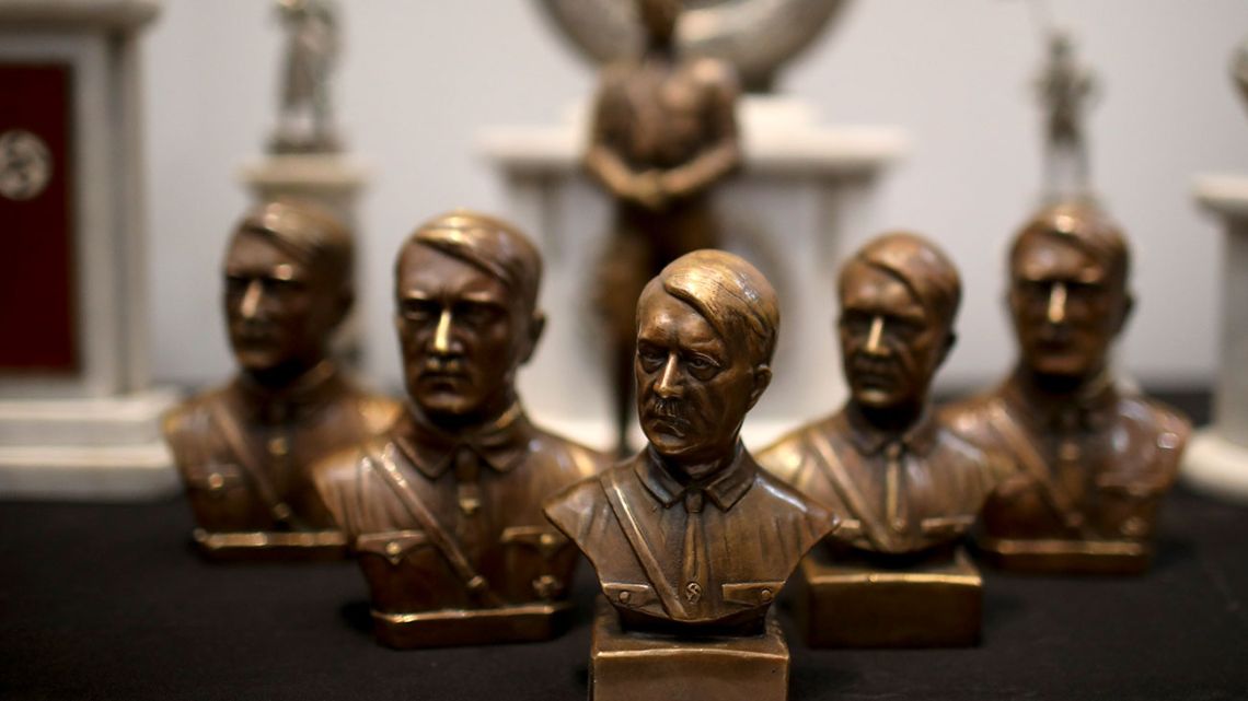 Argentine authorities found the cache of Nazi artifacts in a secret room behind a bookcase, and said that they had uncovered the collection in the course of a wider investigation into artwork of suspicious origin found at a gallery in Buenos Aires.