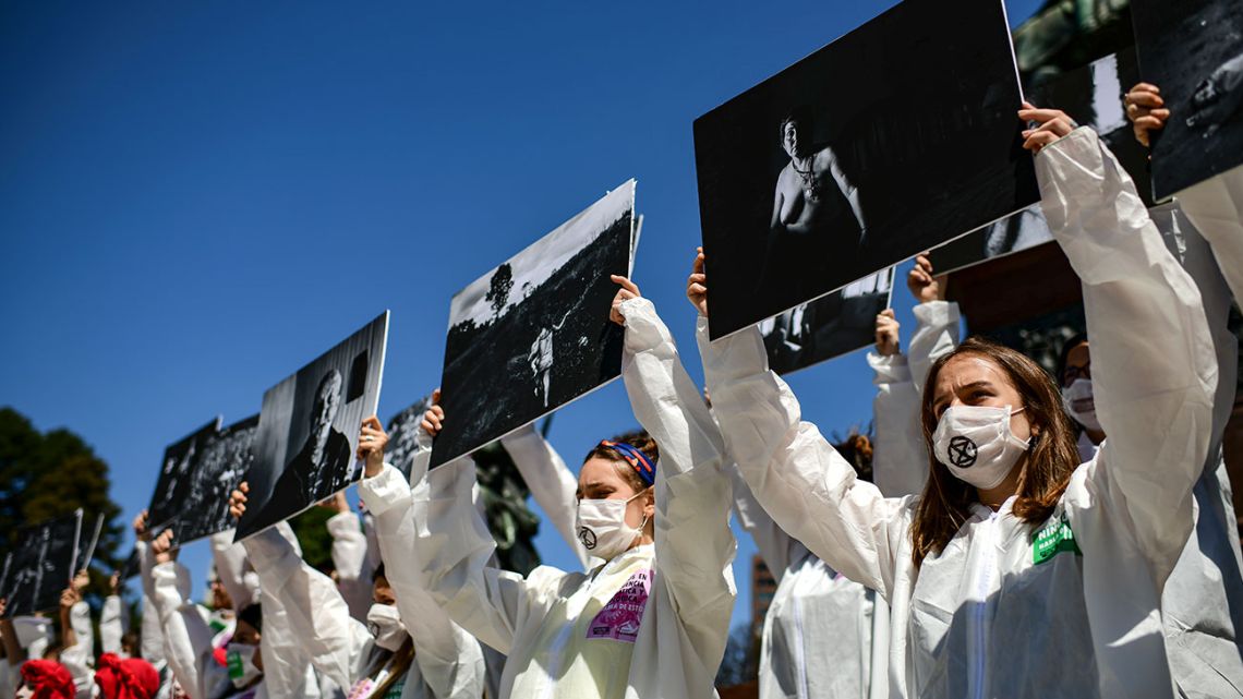 Protestors take part in a demonstration called by climate change activist group Extinction Rebellion, at Plaza San Martín in Buenos Aires on October 7, 2019. The year-old group Extinction Rebellion has energised a global movement demanding governments drastically cut the carbon emissions that scientists have shown to cause devastating climate change.
