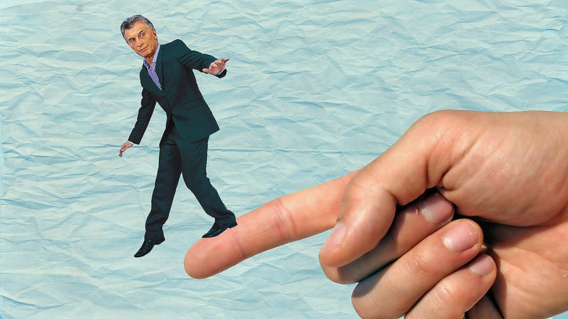 Macri questioned Alberto's use of his pointing finger.