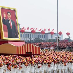 Desfile. Los festejos con la imagen del actual presidente de la República Popular China, Xi Jinping. | Foto:AFP