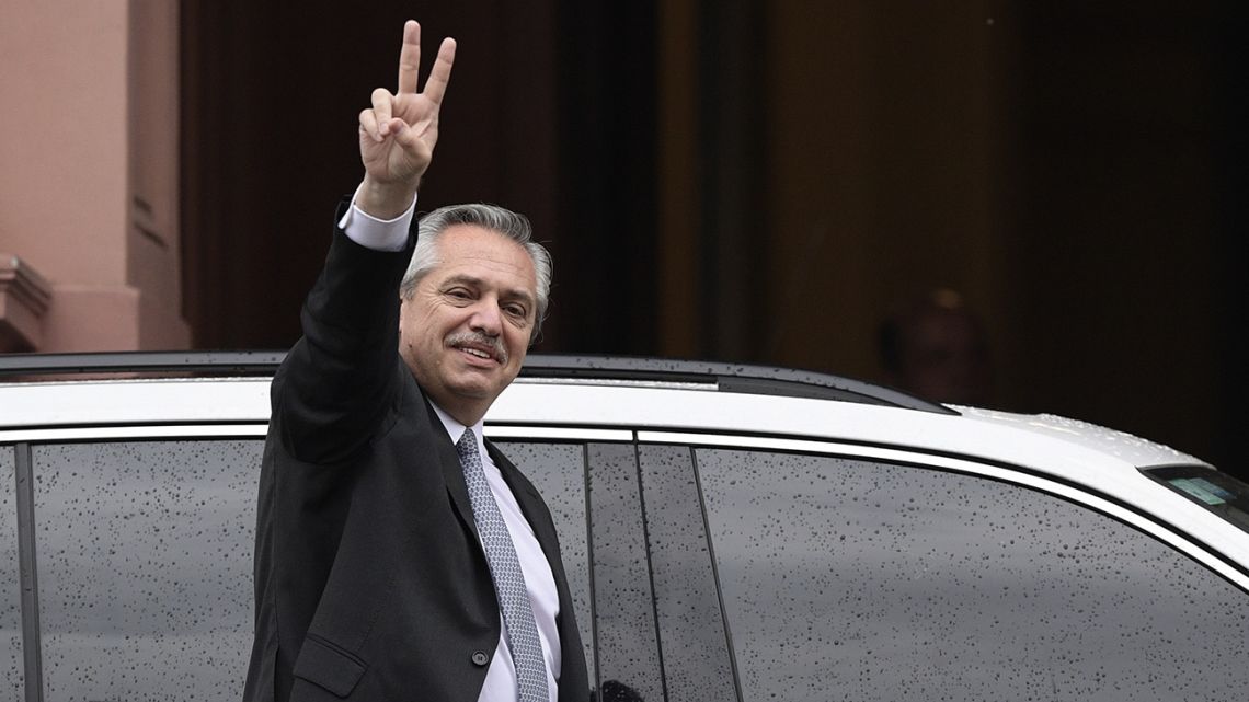 President-elect Alberto Fernandez flashes a 'V' sign as he leaves the Casa Rosada presidential house after a meeting with President Mauricio Macri in Buenos Aires on October 28, 2019. 
