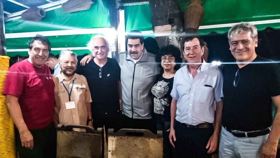 Hugo "Cachorro" Godoy, sindicalista de Chile, Ricardo Peidró, Nicolás Maduro, otra gremialista chilena, Adolfo Aguirre y Julio Fuentes.