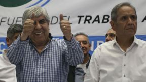Los dirigentes sindicales Hugo Moyano (Camioneros) y Sergio Palazzo (La Bancaria).
